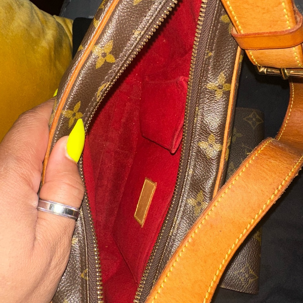 Louis Vuitton purse and wallet. It’s a small purse, but not a mini.